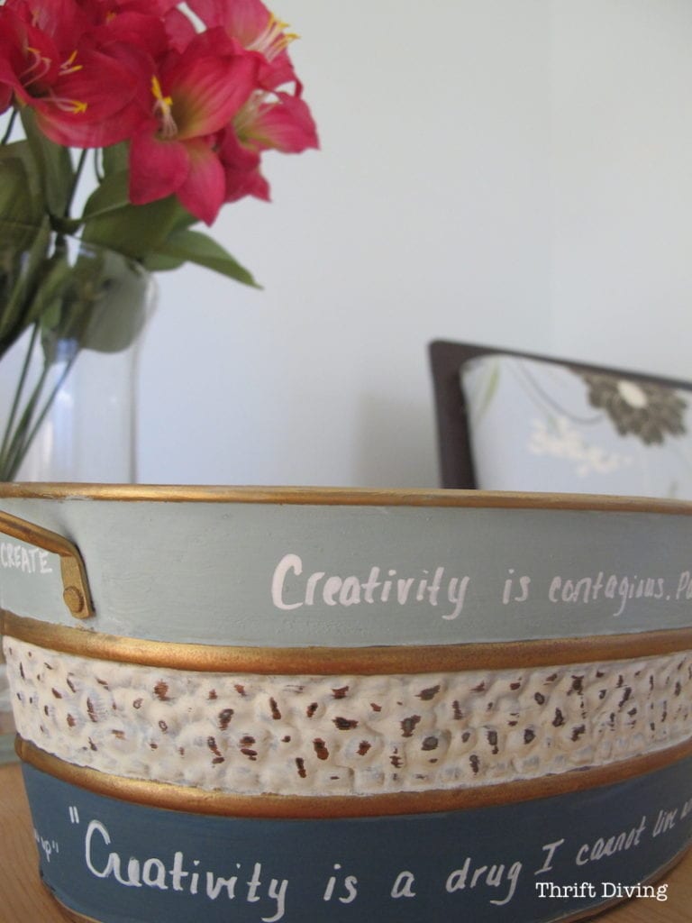 How to Make a DIY Craft Gift Basket - Paint a bucket with quotes about creativity and then stuff it full of craft supplies for a crafting gift basket idea.- Thrift Diving