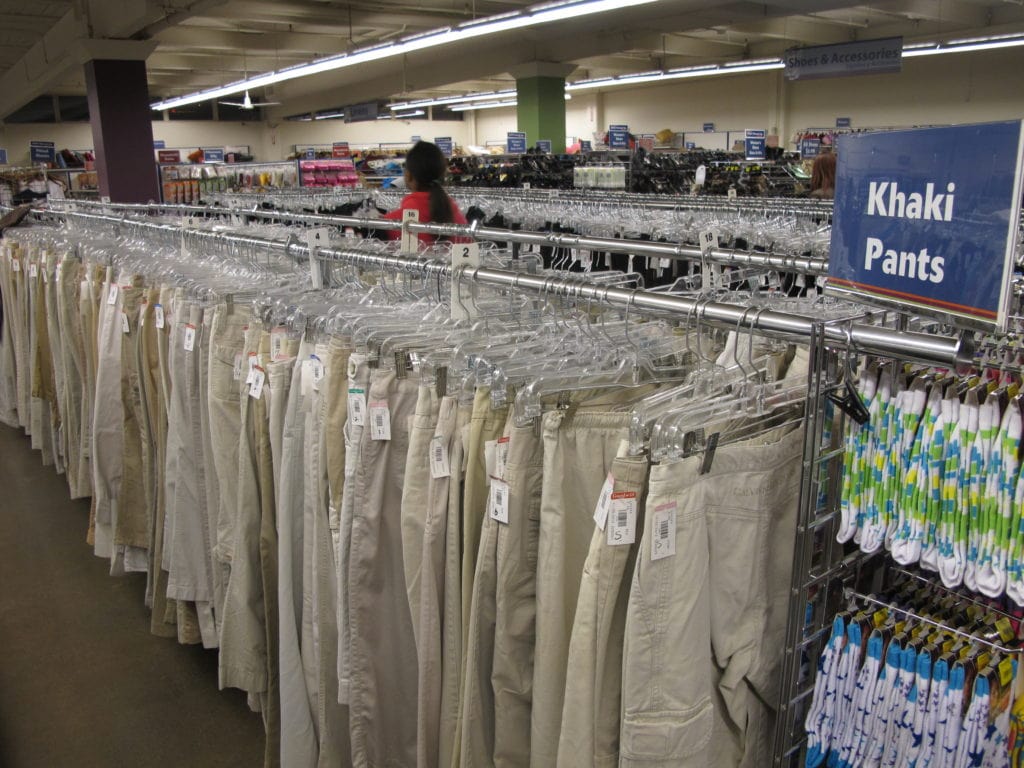 Best thrift store in Seattle - They color code their sweaters to easily find what you're looking for. - Thrift Diving
