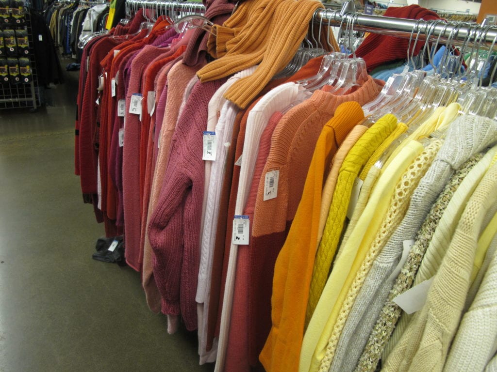 Best thrift store in Seattle - They color code their sweaters to easily find things. - Thrift Diving