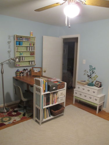 Tips for pulling together a craft room - Pretty turquoise craft room with thrifted furniture. - Thrift Diving