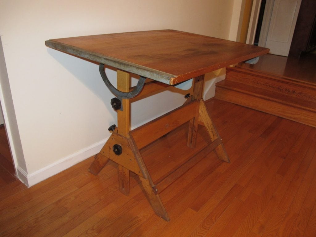 Tips for pulling together a craft room - Use a vintage drafting table. - Thrift Diving