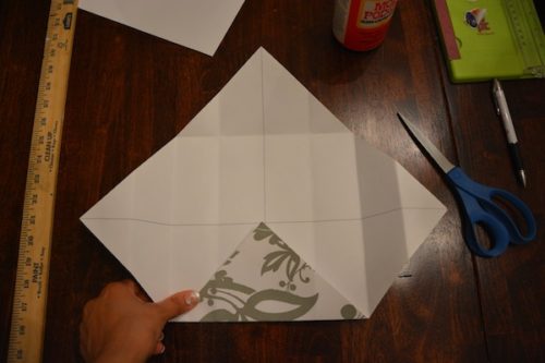 How to Make a Gift Box From Scrapbook Paper - Fold in the bottom corner. - Thrift Diving