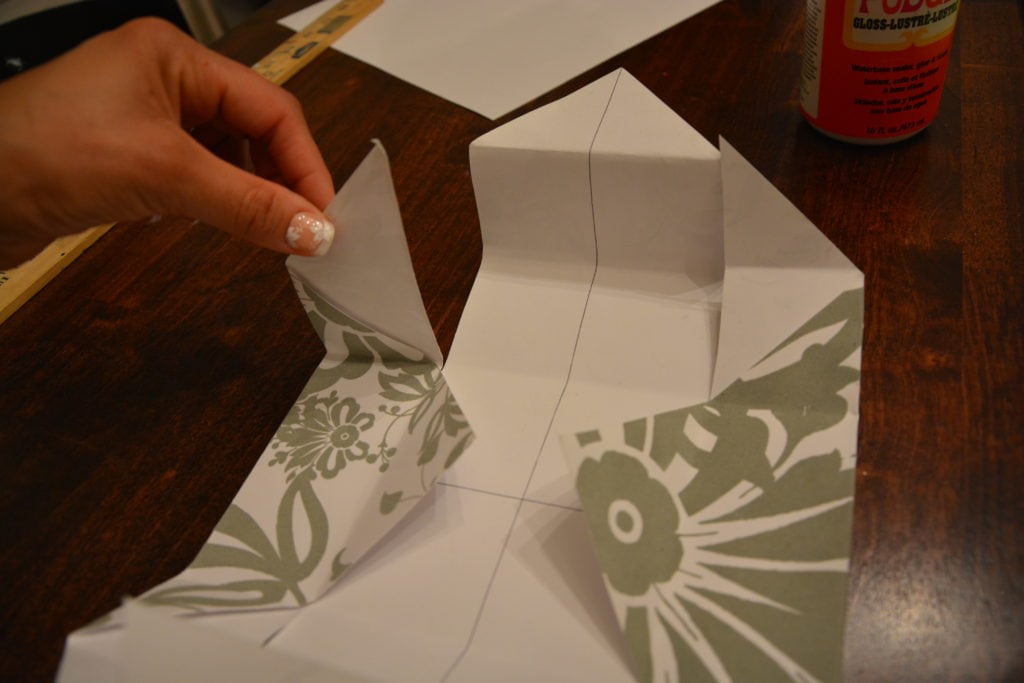 How to Make a Gift Box From Scrapbook Paper - Fold the sides in and you will have these wings. - Thrift Diving