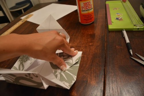 How to Make a Gift Box From Scrapbook Paper - Fold the flaps in on themselves to form the sides. - Thrift Diving