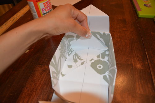 How to Make a Gift Box From Scrapbook Paper - Grab the two flaps. - Thrift Diving
