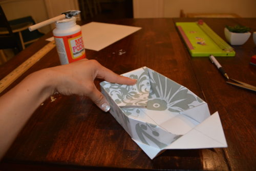 How to Make a Gift Box From Scrapbook Paper - Wrap the flaps over the other edge. - Thrift Diving