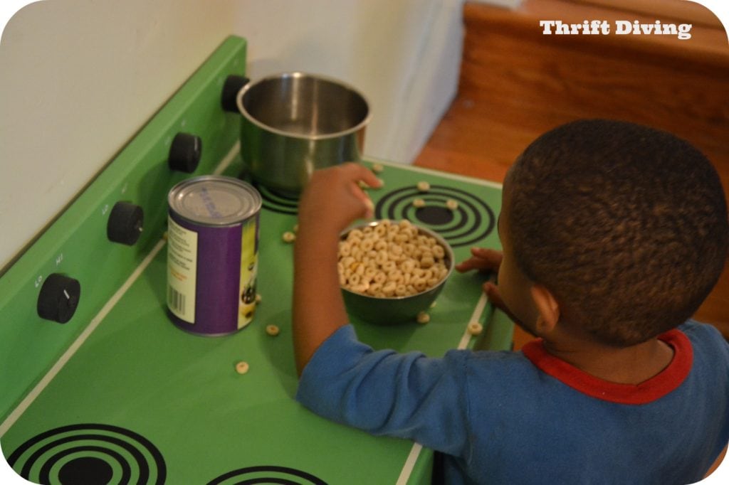 Wooden play kitchen makeover from the thrift store - Kids playing with play kitchen. - Thrift Diving