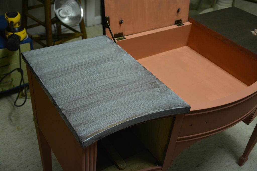 Adding a top coat to stained furniture
