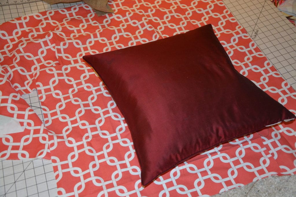 How to Make No-Sew Pillow Covers - Create a pattern by laying the pillow on the fabric. - Thrift Diving