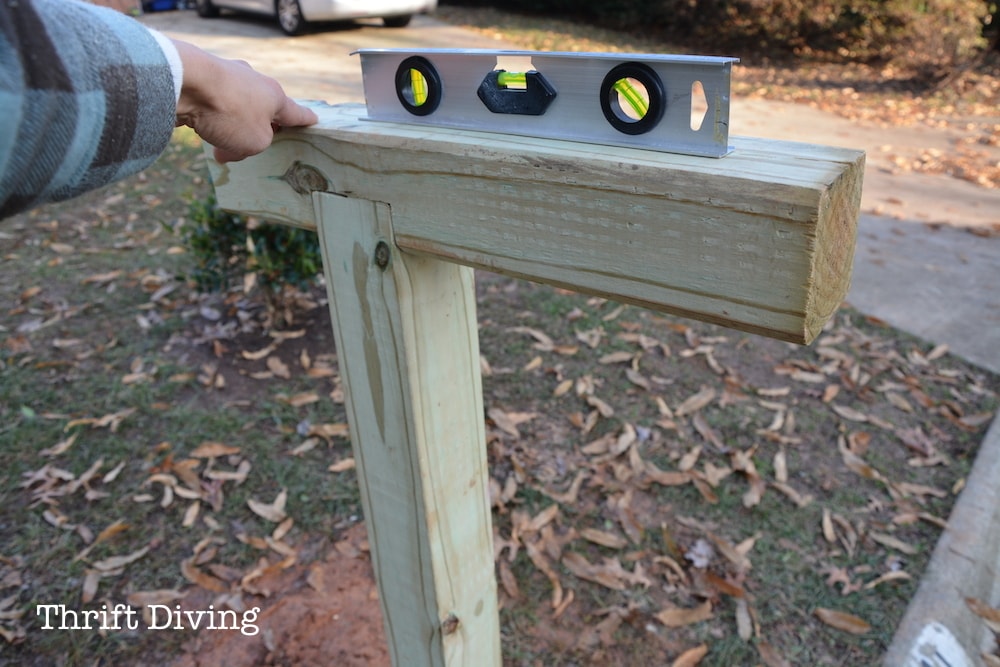 How to Build Paint and Install a Custom DIY Mailbox - Make sure your post is level. - Thrift Diving