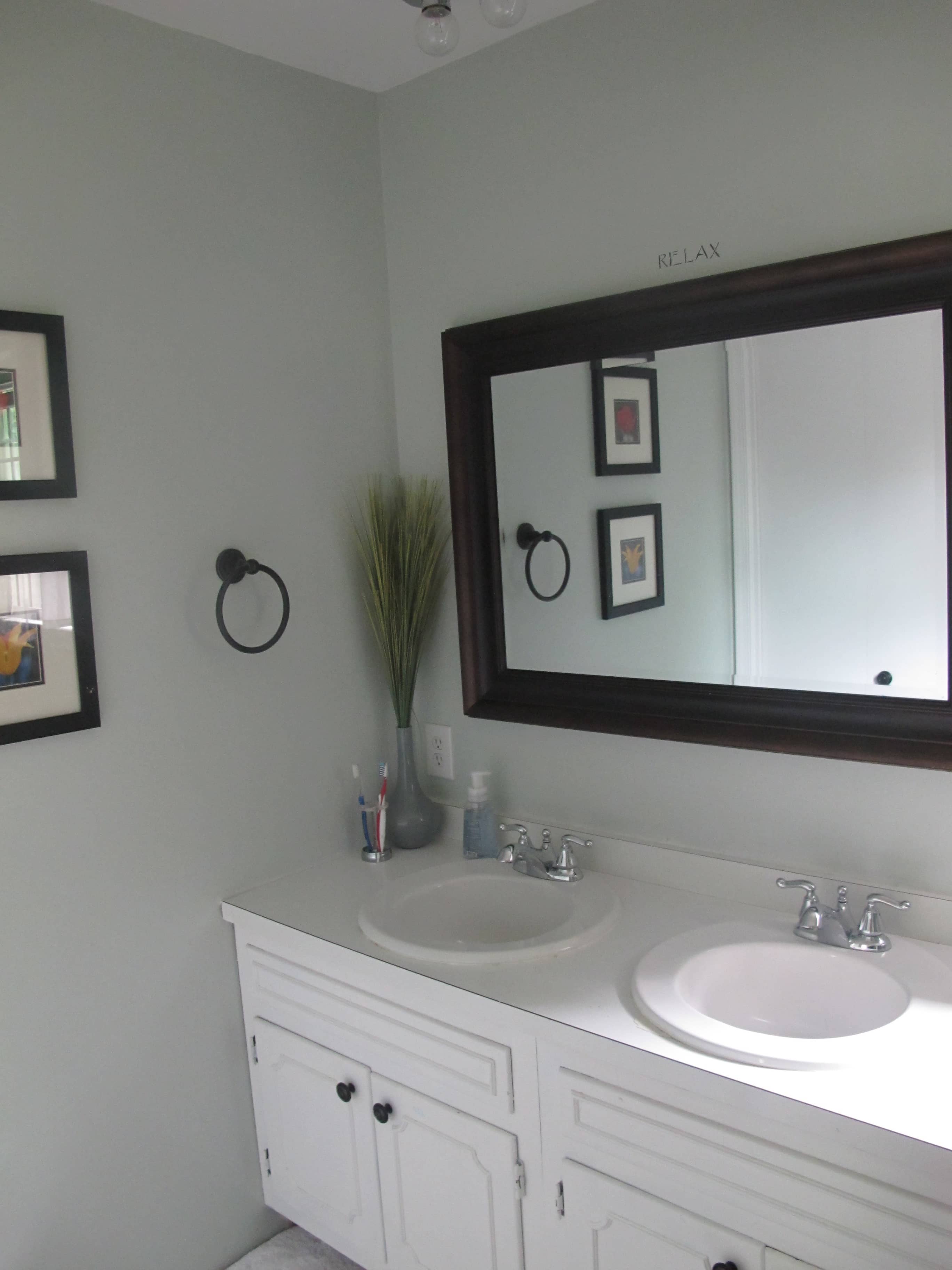 Pretty lavender bathroom makeover -Bathroom makeover with Sherwin Williams Sea Salt. - Thrift Diving