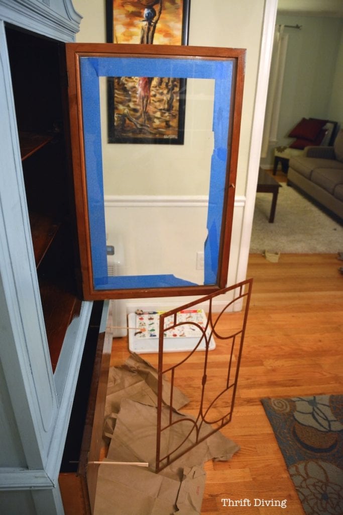 Painted China Cabinet Makeover - Remove the wooden insert from the china cabinet door prior to painting. - Thrift Diving