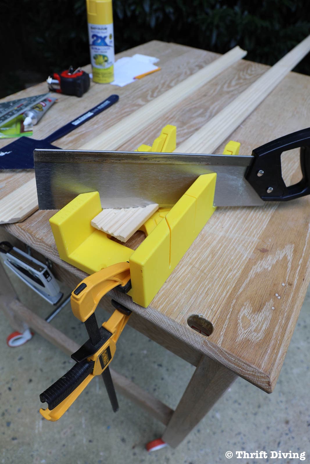 How to Make a Big DIY Whiteboard - Use a miter box and cut the trim to 45 degree angles on each end. - Thrift Diving