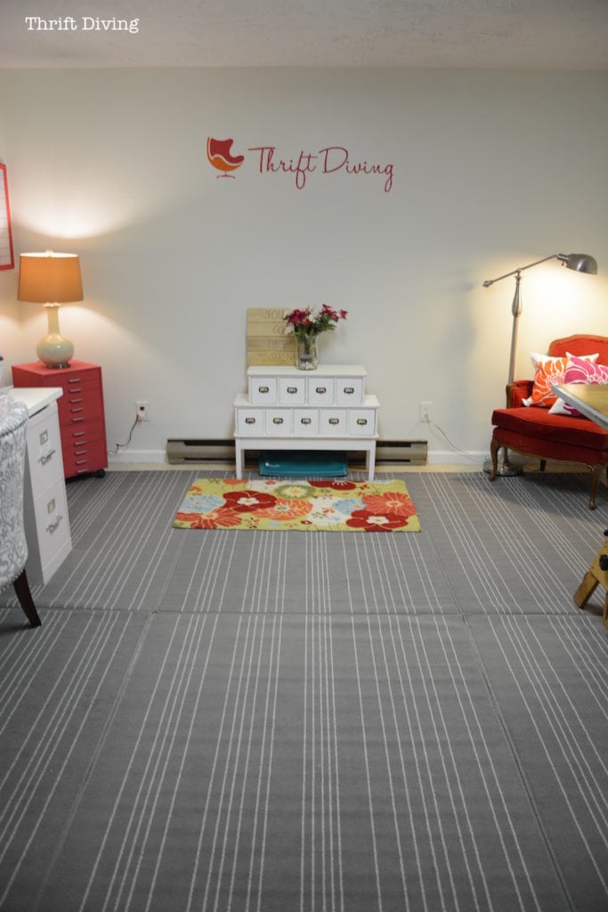 Basement Office Makeover - Turn your cluttered basement into a clean, functional basement office with living space. To cover cold basement floors, get IKEA rugs and lay them side by side to create larger rug. - Thrift Diving