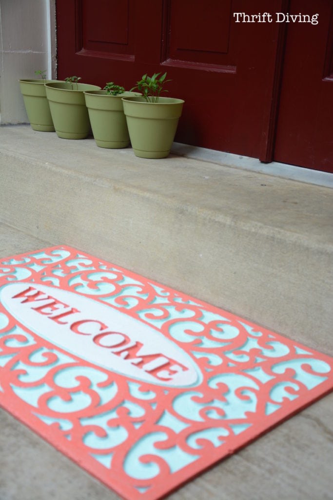 How to Paint a Custom Welcome Mat - AFTER - Love the coral and turquoise paint colors! - Thrift Diving