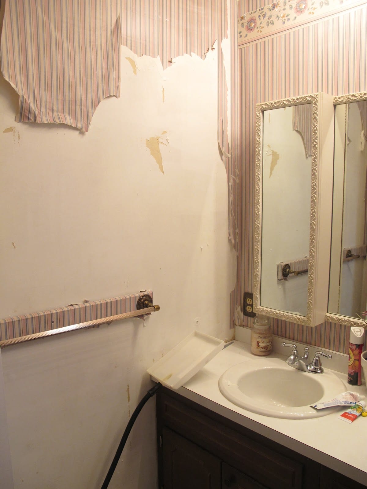 Pretty lavender bathroom makeover - Wallpaper was removed from old bathroom. - Thrift Diving
