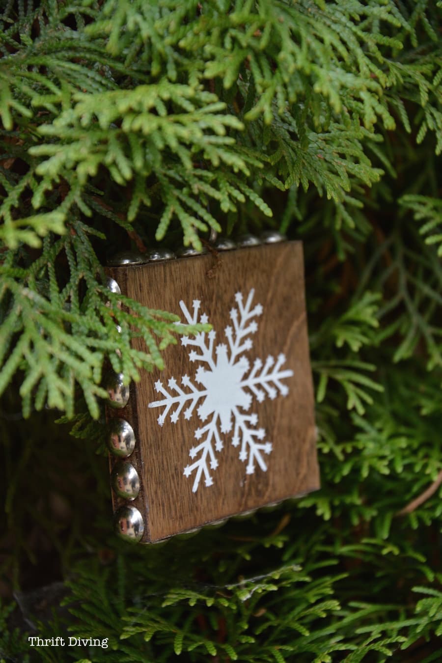 DIY wooden Christmas Ornaments - Wooden studded ornament with snowflake stencil. - Thrift Diving