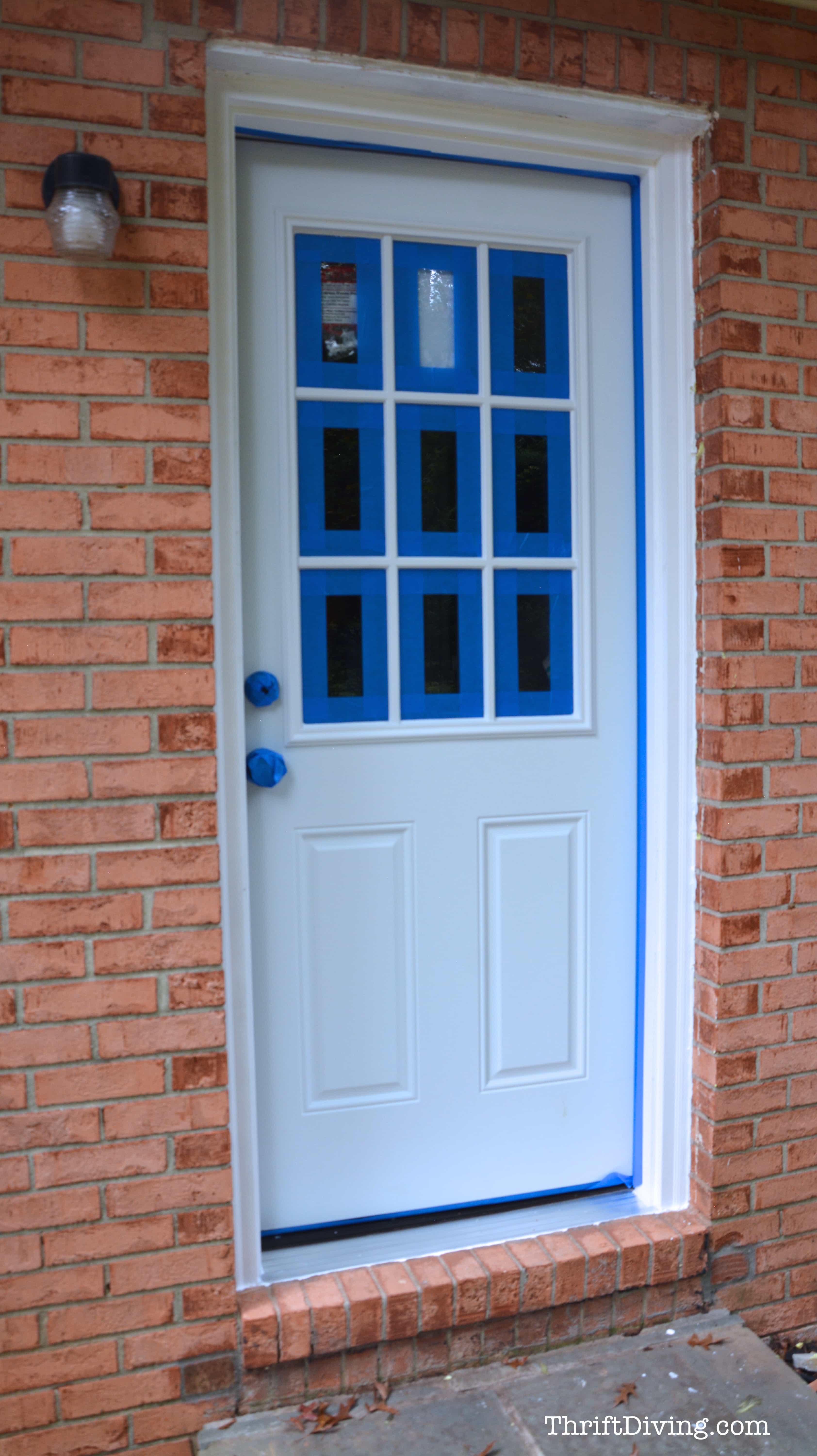 How to Paint and Stencil a Door - Step 2 - Tape off the door - ThriftDiving