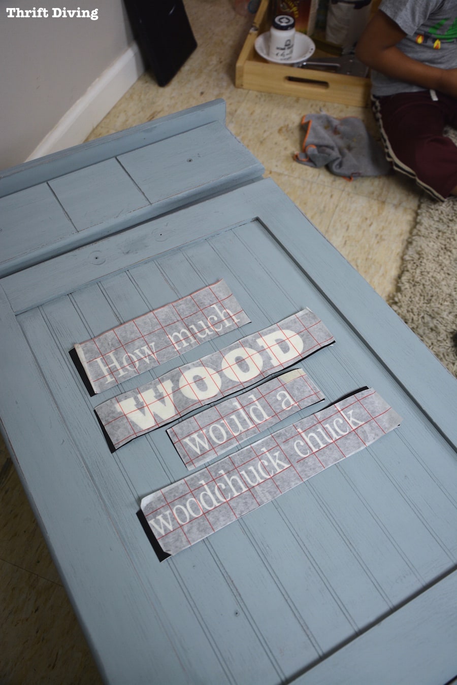 Wooden Trash Can Makeover - Use a stencil on painted wood for a unique look - Thrift Diving