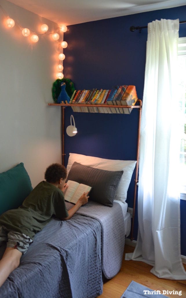 Tween Boys Blue Bedroom Makeover - Give kids a cozy place to read and relax with this bedroom makeover and DIY copper piping headboard with bookshelf. | Thrift Diving