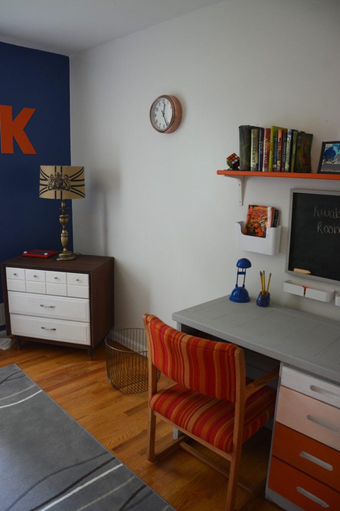 Tween Boys Blue Bedroom Makeover - This cozy boys bedroom using Behr Mosaic Blue, thrifted mid-century modern dresser, thrifted chair, and wall clock from Target. | Thrift Diving