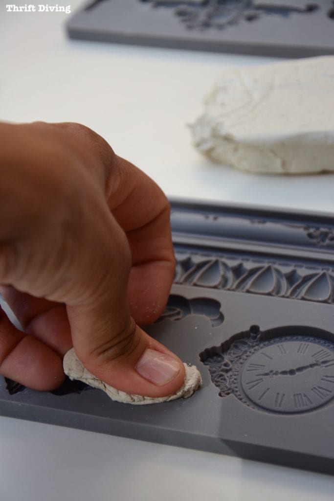 How to Make Furniture Appliques with Clay Molds - Press clay into the silicone clay mold. - Iron Orchid Designs