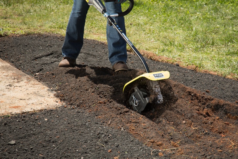 How to Create Landscape Beds - Till in garden soil to add in nutrients