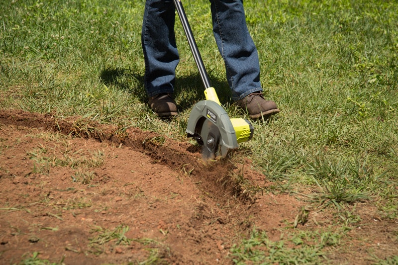 How to Create Landscape Beds - Use an edger to finish off the sides