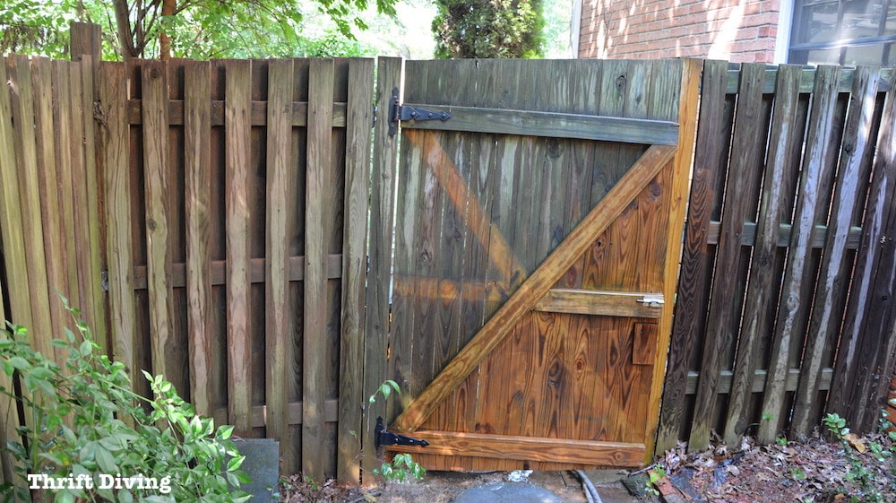 How to Use a Pressure Washer - Pressure washing a dirty fence. - Thrift Diving