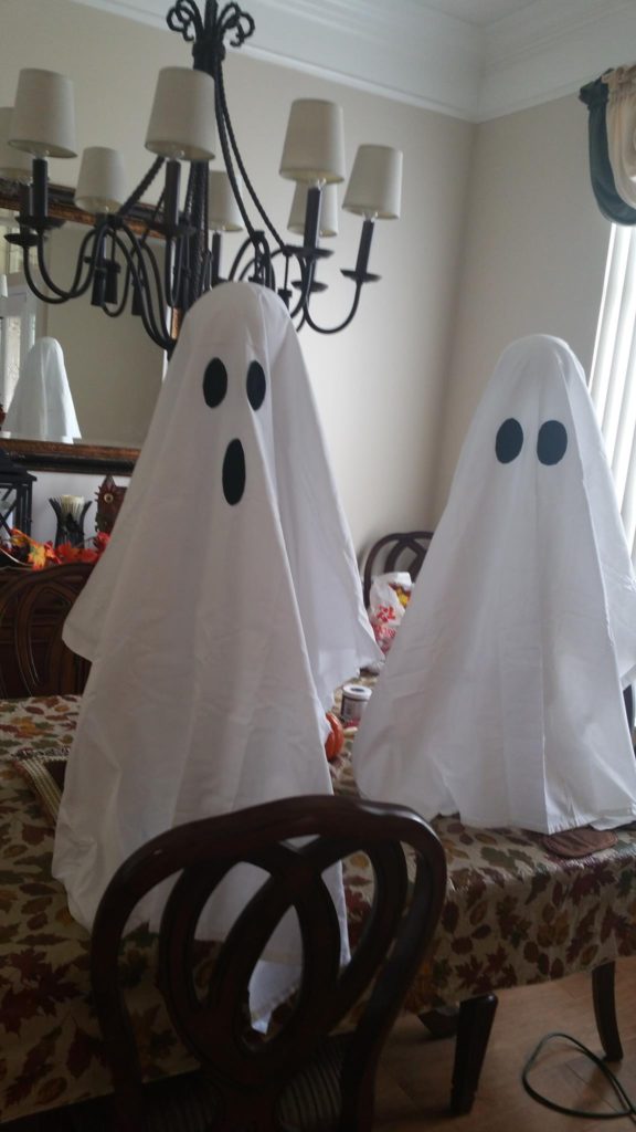How to Make Halloween Ghost Lights For Your Front Porch - Make multiple ghost lights. - Thrift Diving