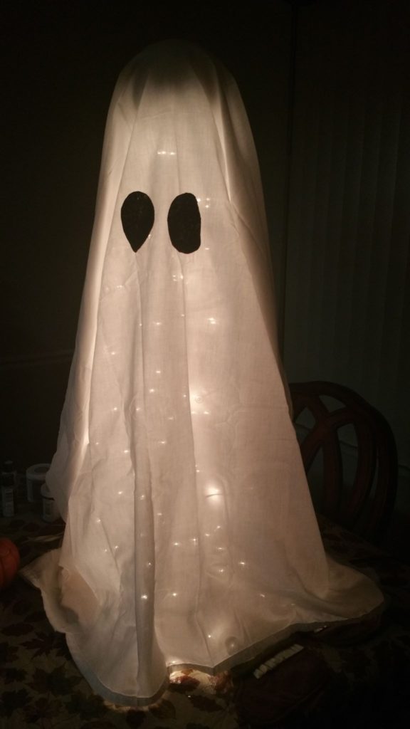 How to Make Halloween Ghost Lights For Your Front Porch - Light up ghost lights. - Thrift Diving