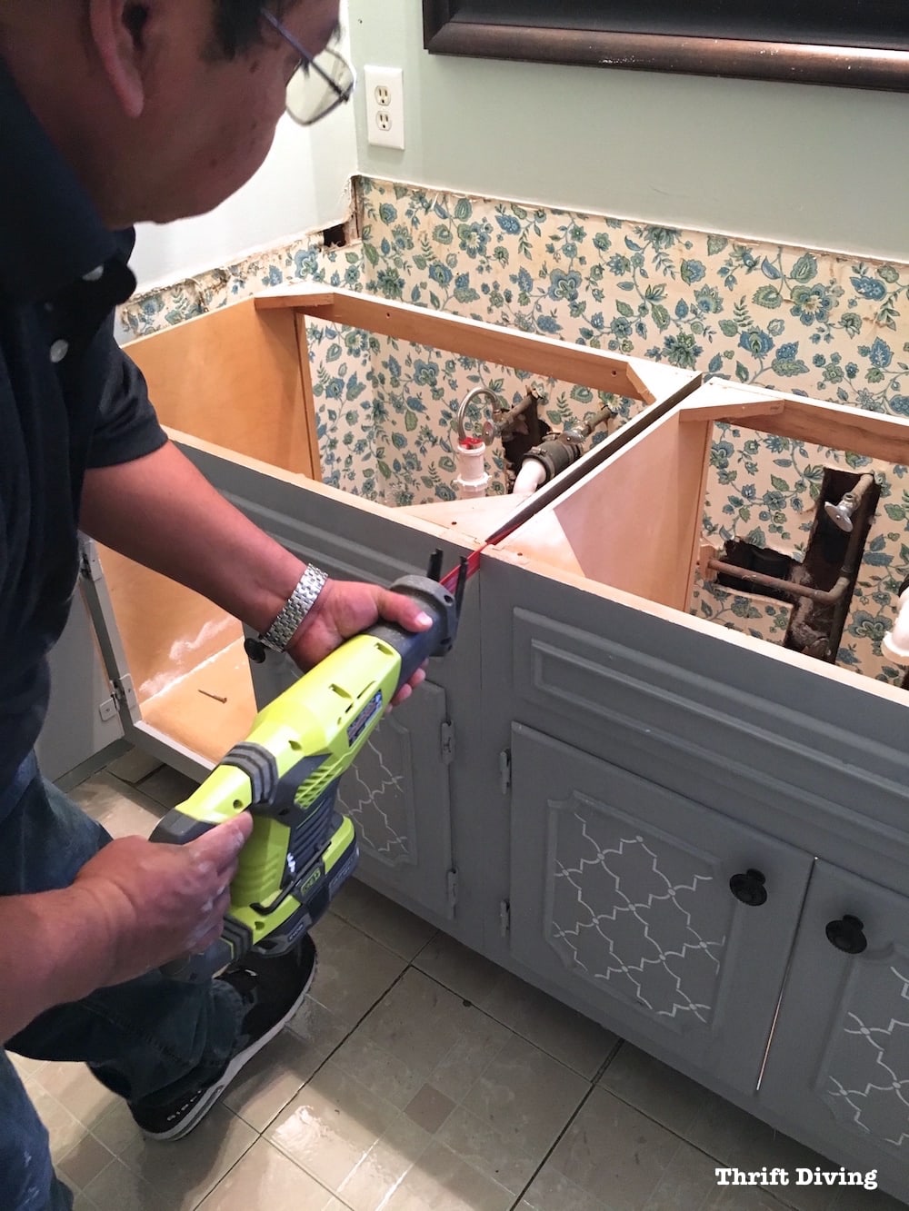 Pretty lavender bathroom makeover - Removing the old bathroom vanity. - Thrift Diving