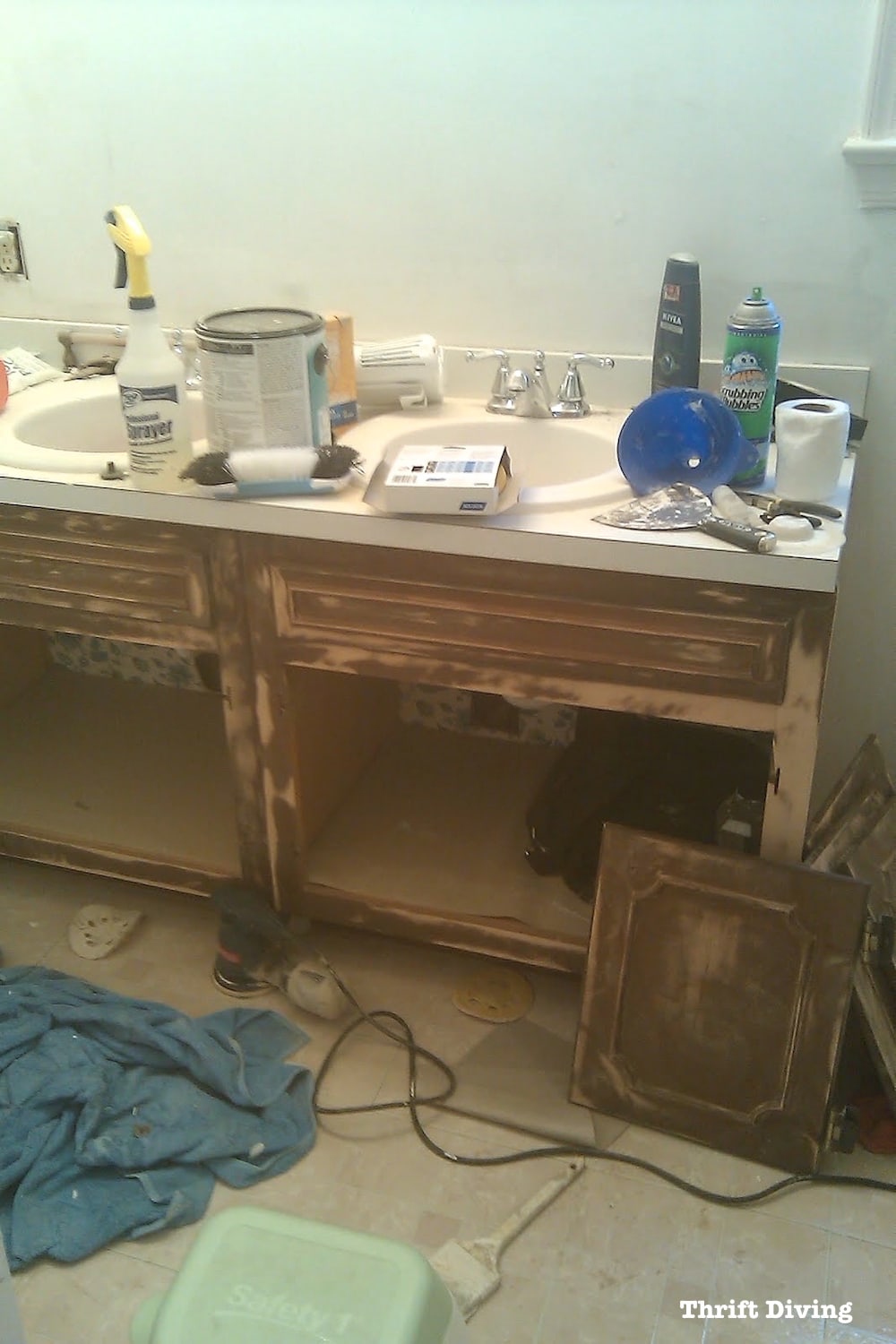 Pretty lavender bathroom makeover - Old bathroom vanity from the 70's was sanded and painted. - Thrift Diving
