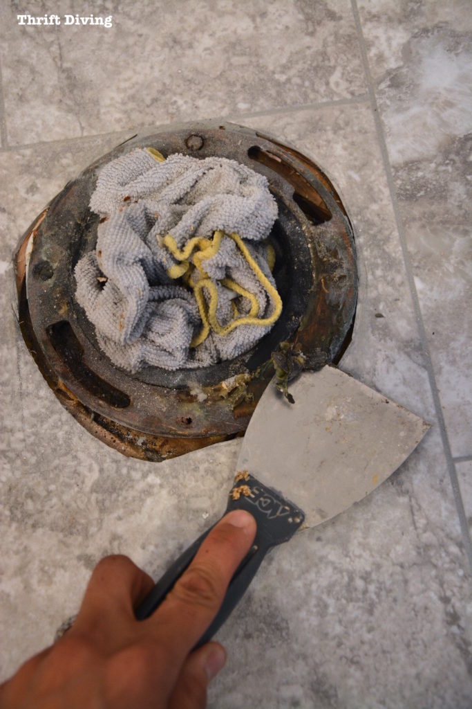 How to install a toilet yourself. Stop paying for plumbers - Plug a rag in the sewer line. - Thrift Diving