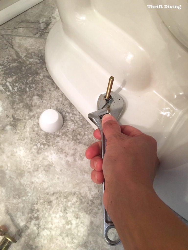How to install a toilet yourself. Stop paying for plumbers - Trim the excess bolt. - Thrift Diving