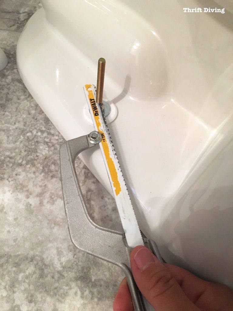 How to install a toilet yourself. Stop paying for plumbers - Trim the excess bolt wth a hacksaw. - Thrift Diving