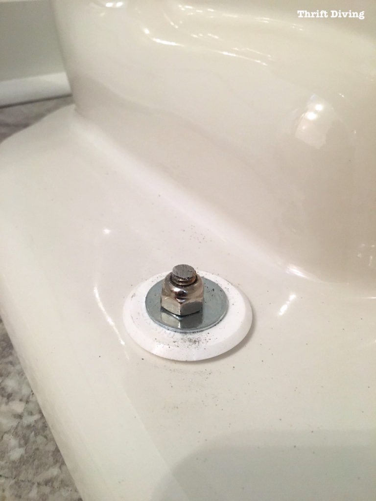 How to install a toilet yourself. Stop paying for plumbers - Trimmed toilet bolt. - Thrift Diving