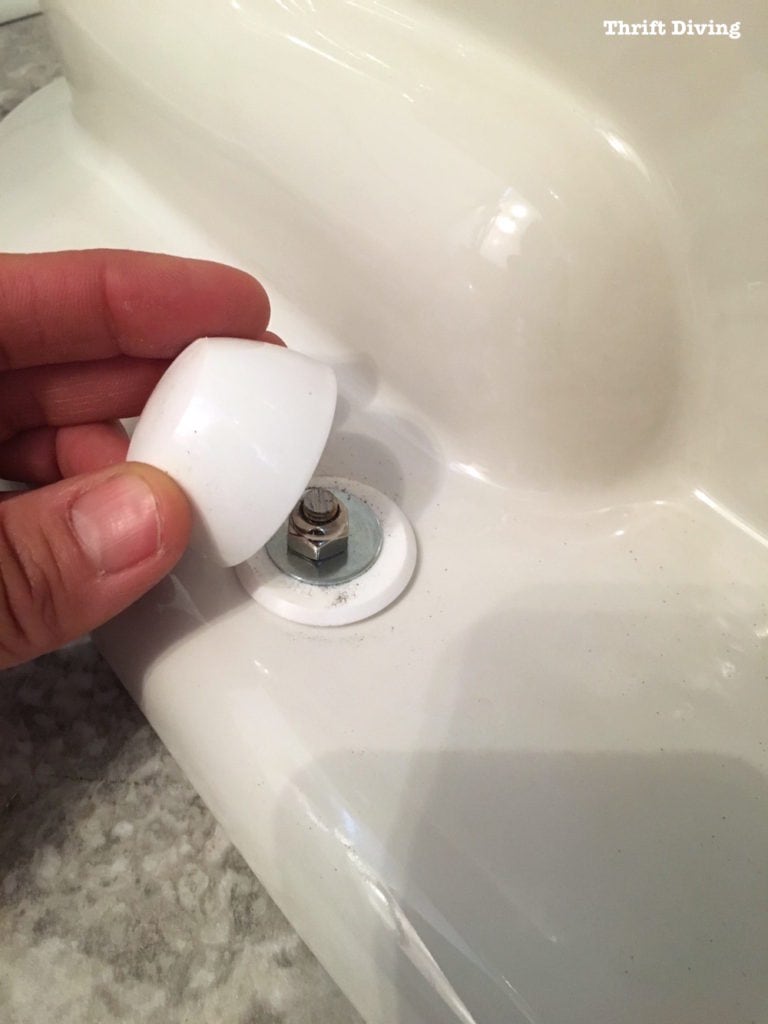 How to install a toilet yourself. Stop paying for plumbers - Add cap over trimmed toilet bolt. - Thrift Diving