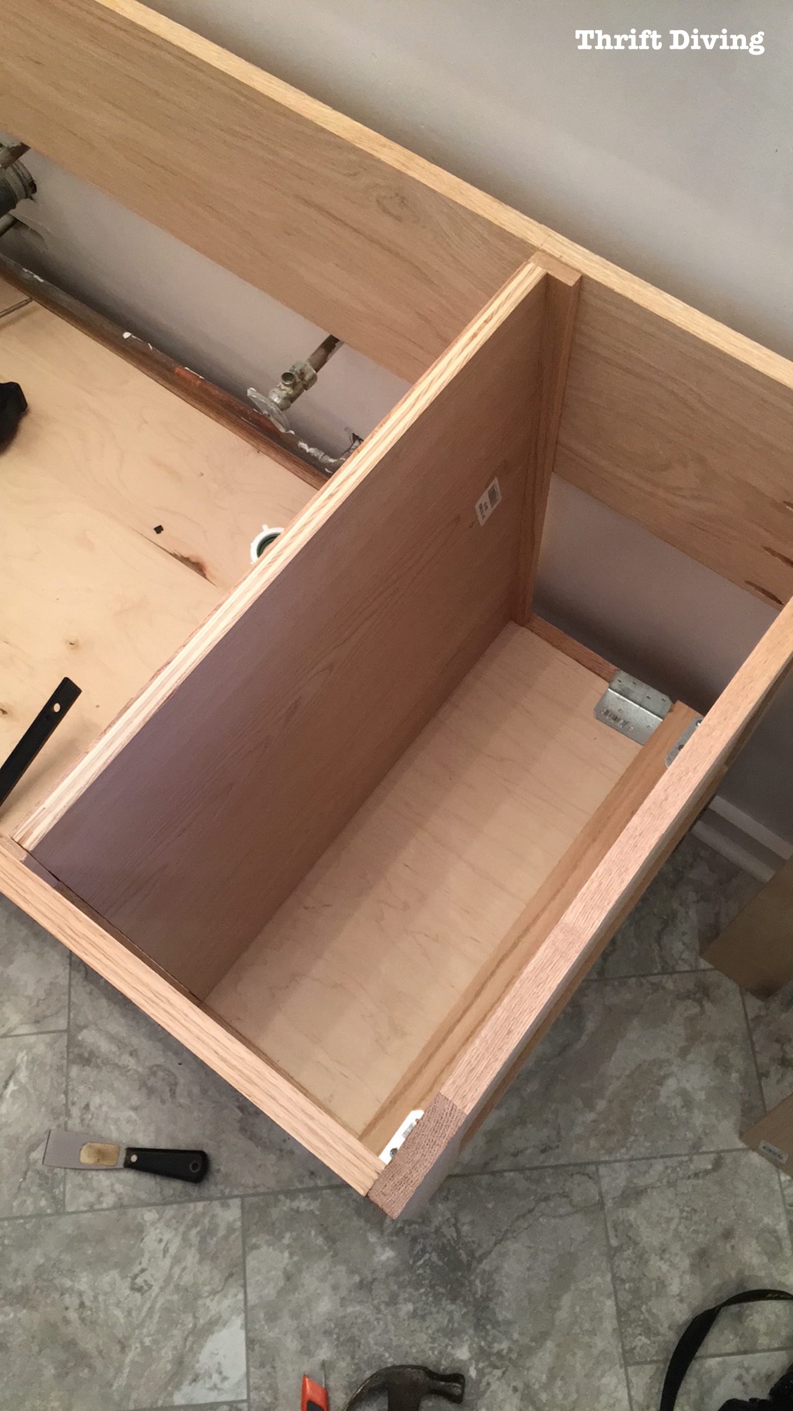 Build-a-DIY-bathroom-vanity-adding-partitions-Thrift-Diving 7