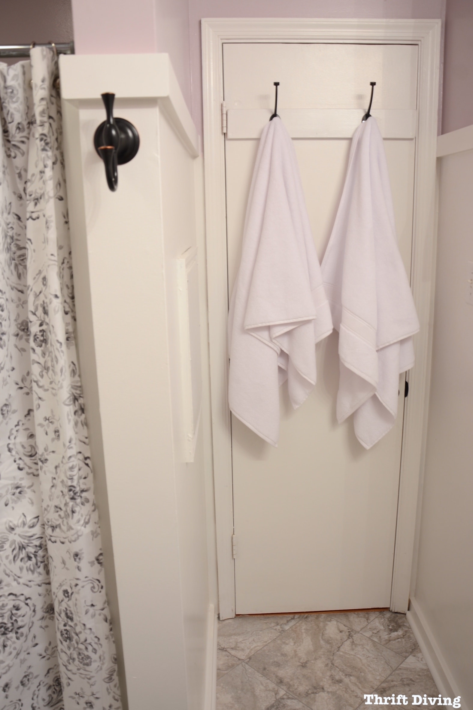 Pretty lavender master bathroom makeover - Behr Mulberry Stain wall color and hook on door. - Thrift Diving