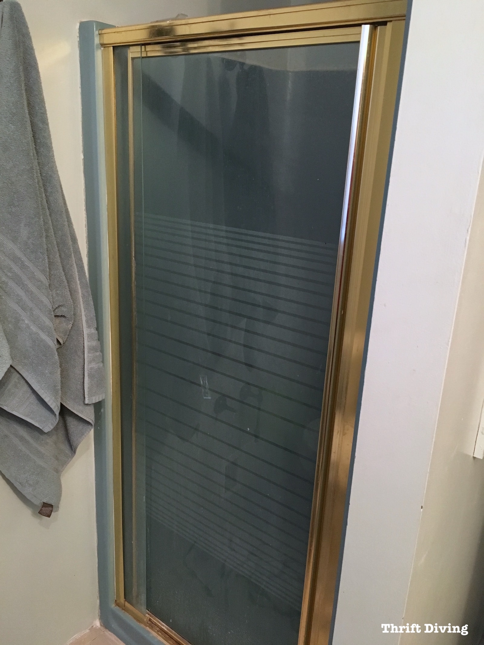 Master bathroom makeover - Remove-an-old-shower-stall-door-frame-thriftdiving