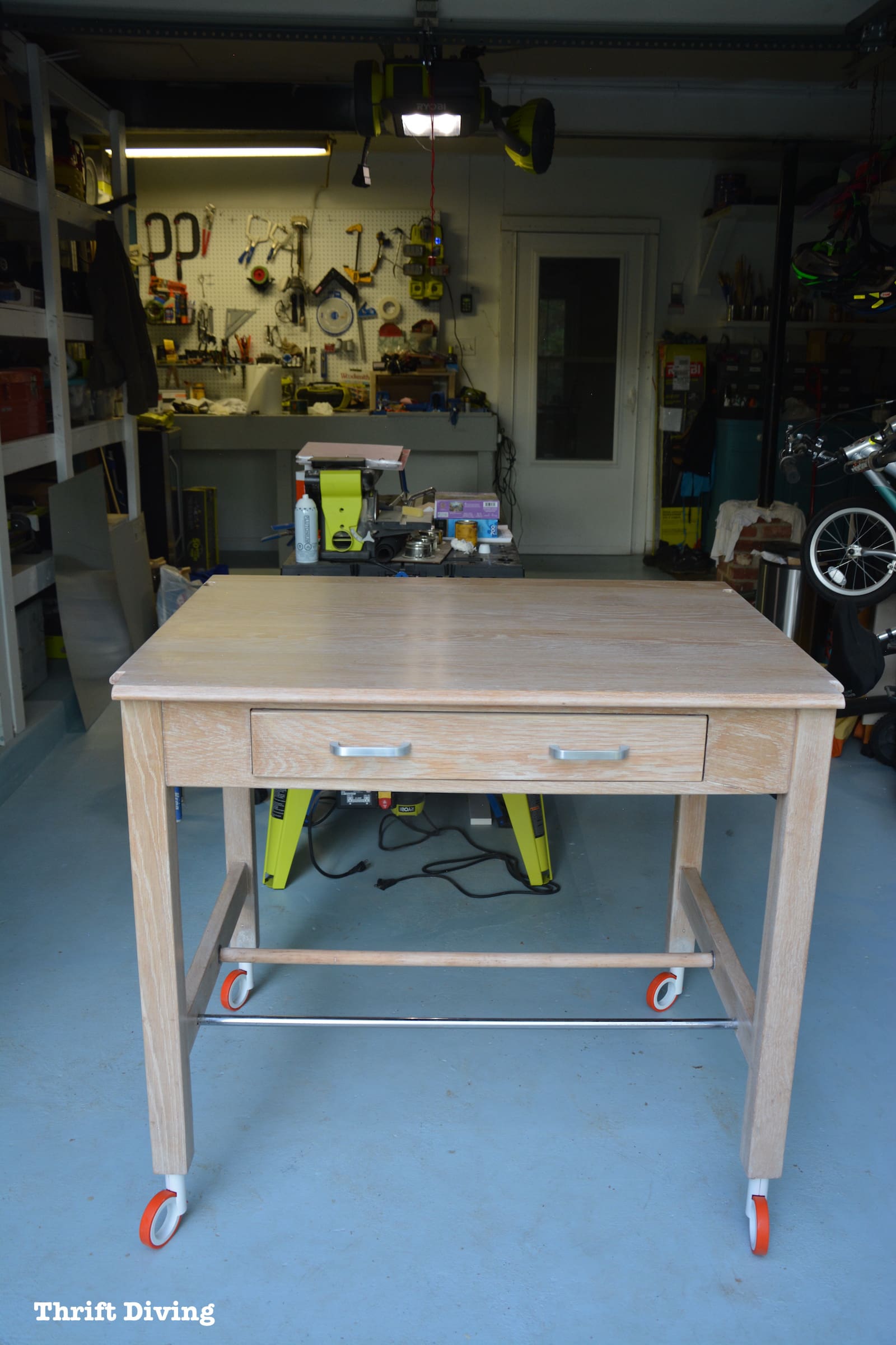 Strip furniture back to its natural wood - Turn a thrifted drafting table into a DIY garage workstation | Thrift Diving