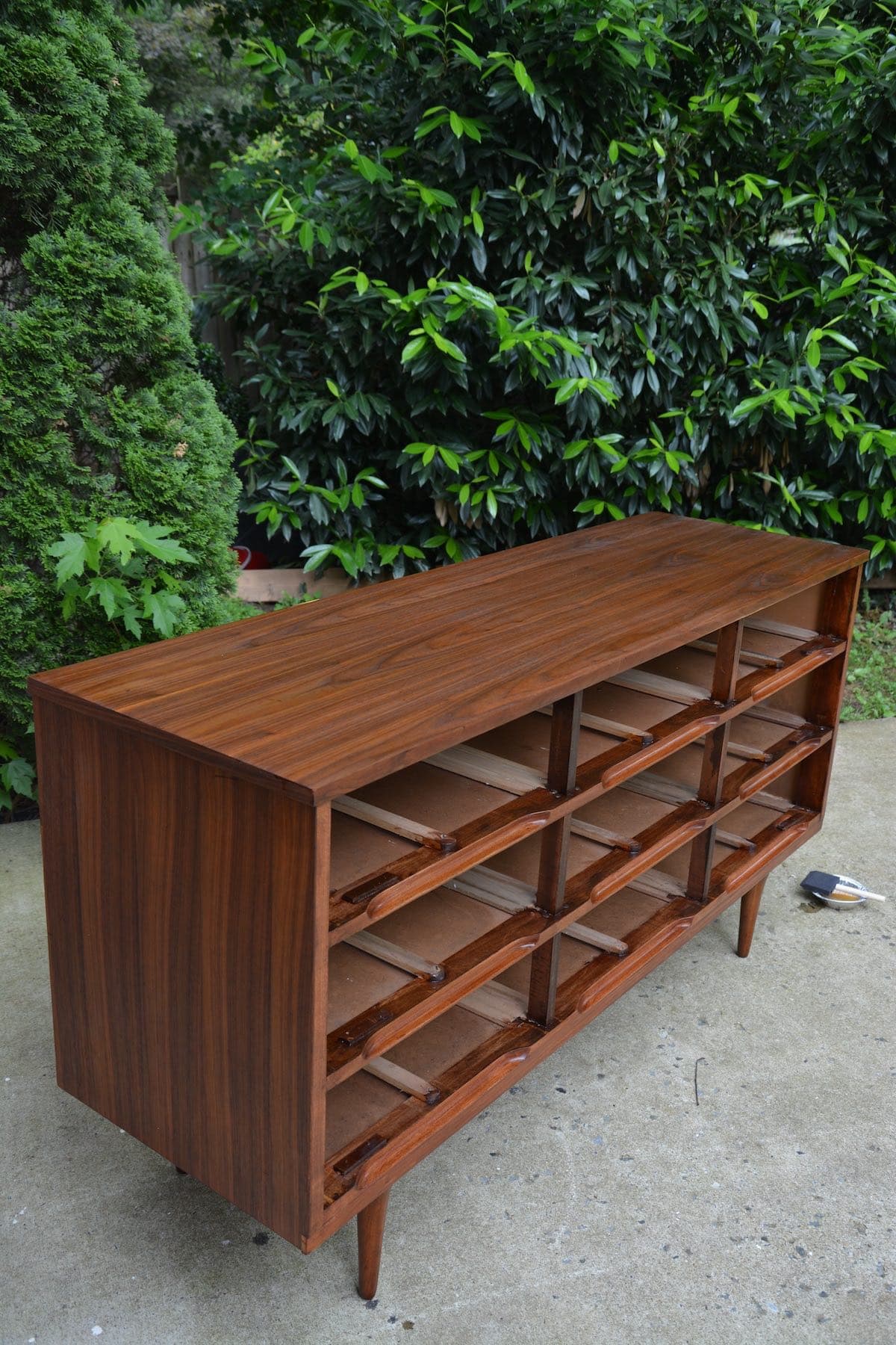 Mid-Century Modern Dresser Makeover Stripped and Refinished - Top coat dries over the surface. - Thrift Diving