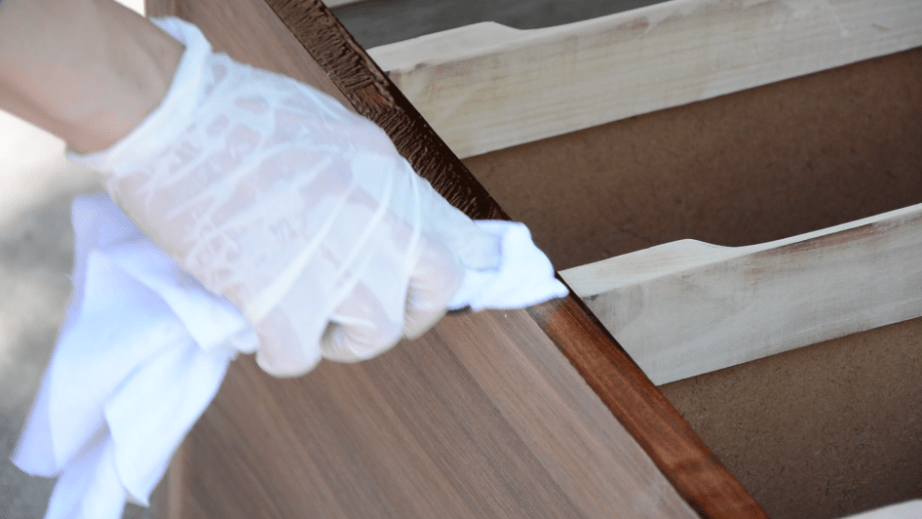 Mid-Century Modern Dresser Makeover Stripped and Refinished - Apply gel stain to dresser. - Thrift Diving