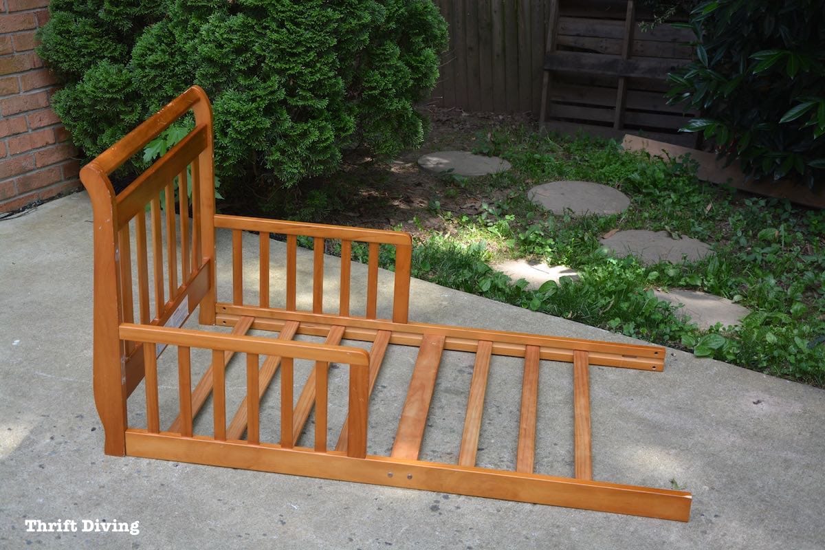 Repurposed toddler bed: What to do with an old toddler bed - Turn a toddler bed into a garden bench for your yard.- BEFORE - Thrift Diving