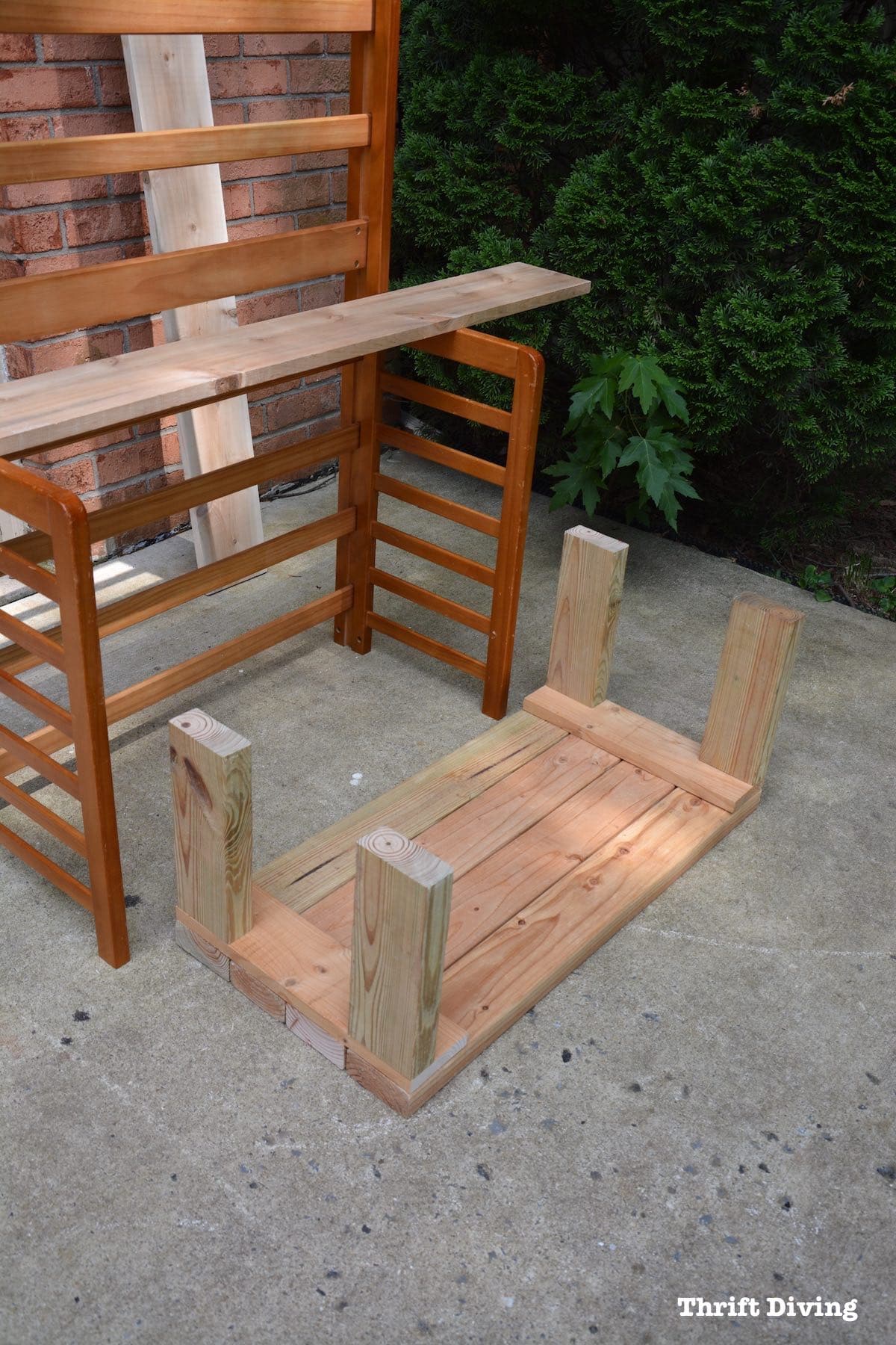 Repurposed toddler bed: What to do with an old toddler bed - A toddler bed can be repurposed into a potting bench - Build the base. - Thrift Diving