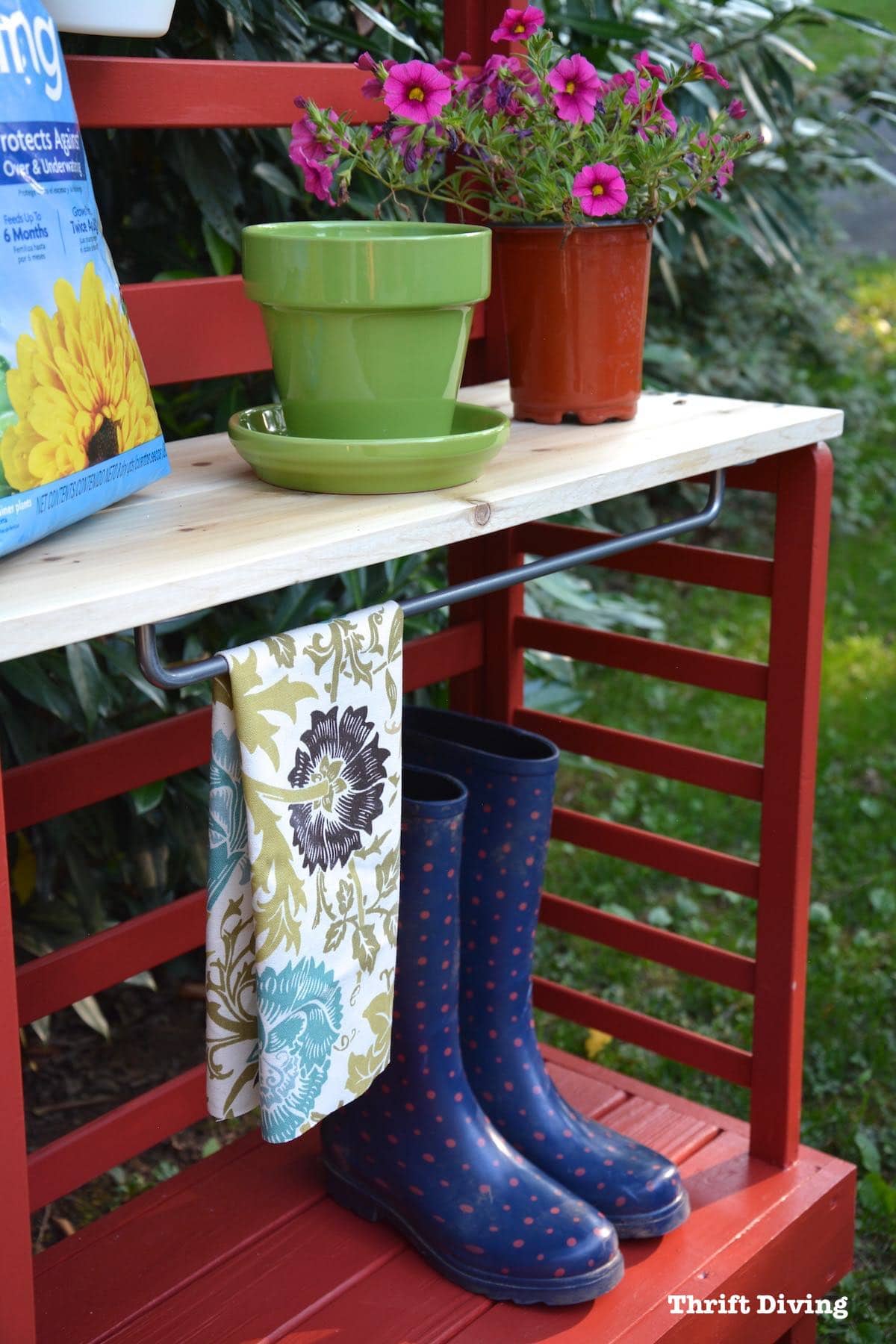 Repurposed toddler bed: What to do with an old toddler bed - Turn a toddler bed into a garden bench for your patio with shelving, storage, and towel bar. - Thrift Diving