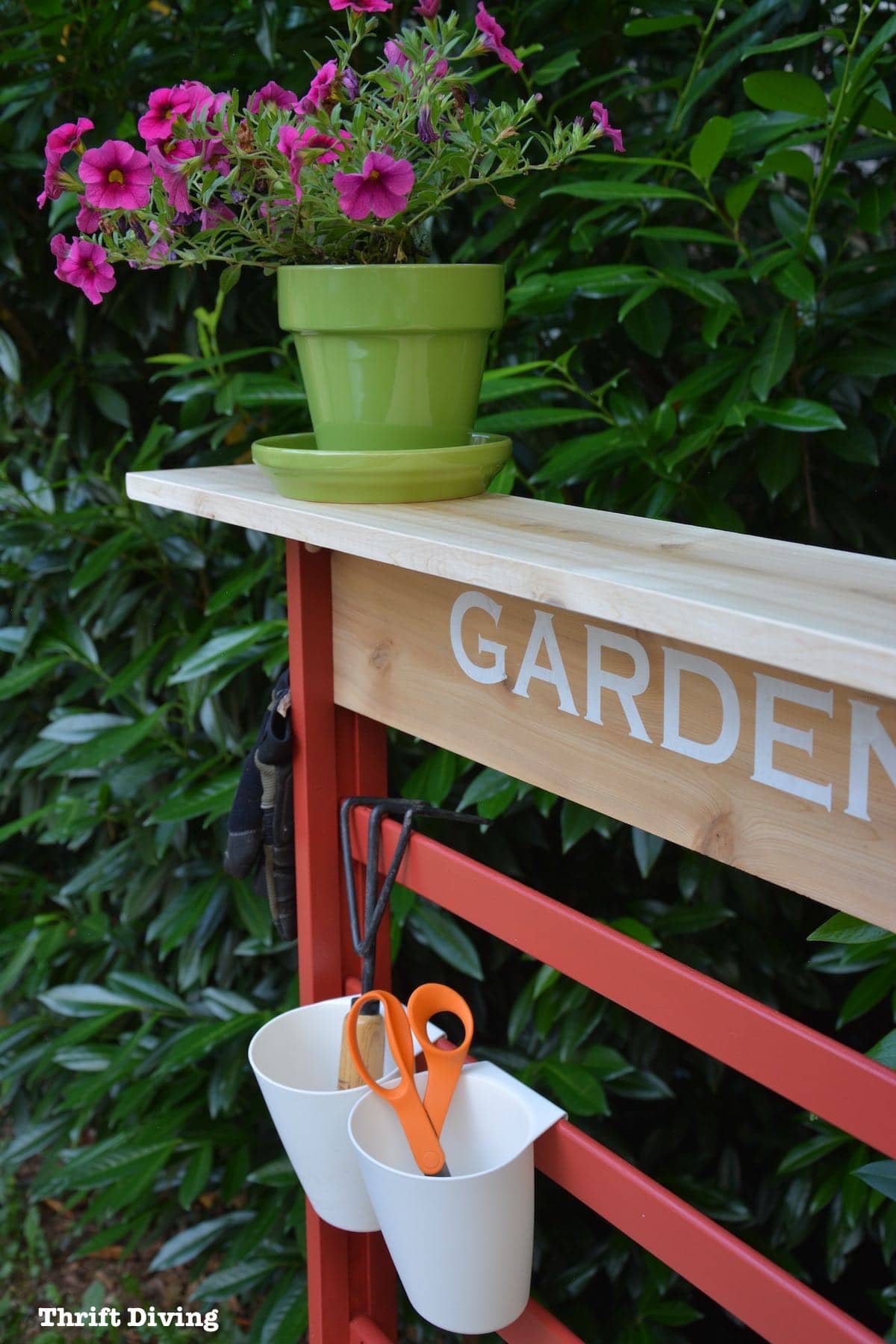 Repurposed toddler bed: What to do with an old toddler bed - Turn a toddler bed into a garden bench and add a shelf on top. - Thrift Diving