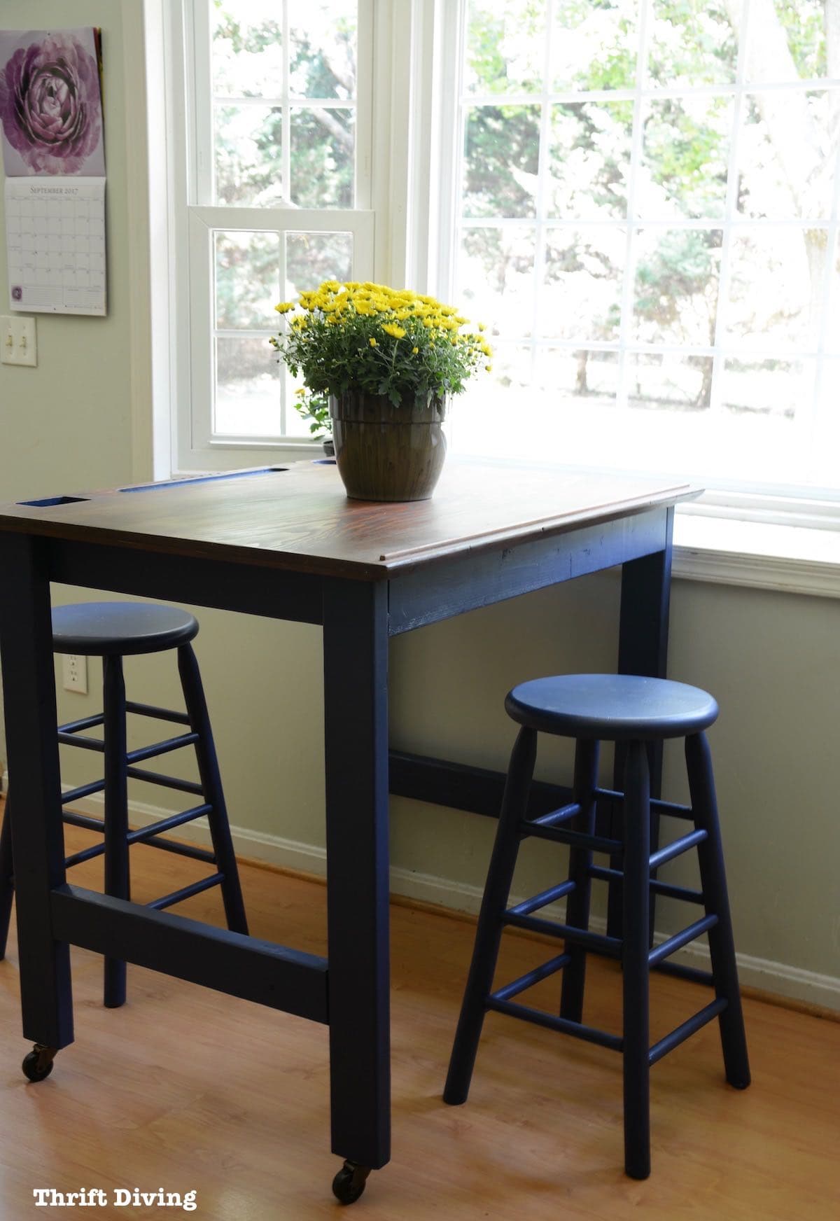 BEFORE & AFTER: Make your own DIY eat-in kitchen table in a Navy blue paint and refinished kitchen table top! | Thrift Diving Blog - See over 500 post and projects on the blog!