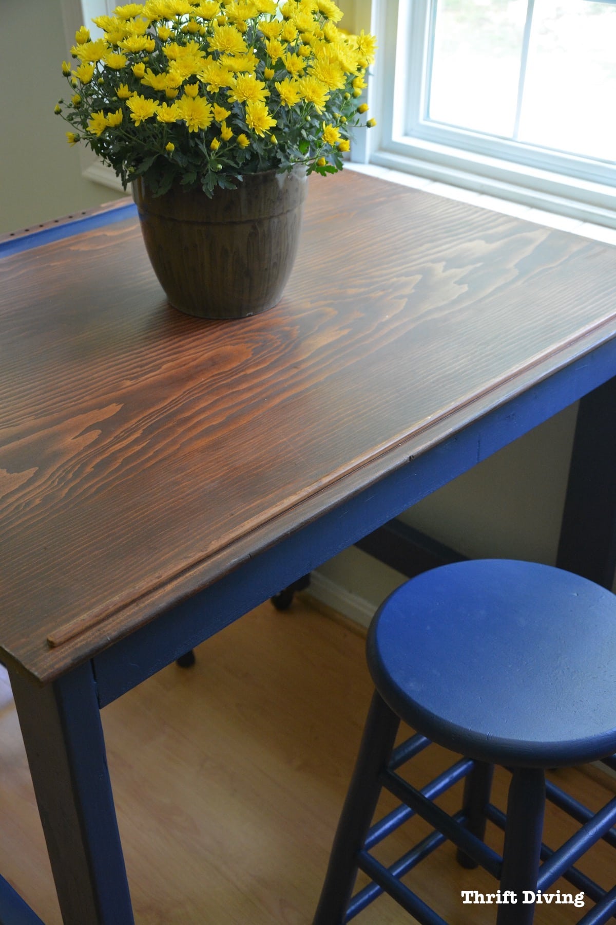 This gorgeous eat-in kitchen table makeover started out as a drafting table top and a table base was made for it. | Thrift Diving - See over 500 post and projects on the blog!